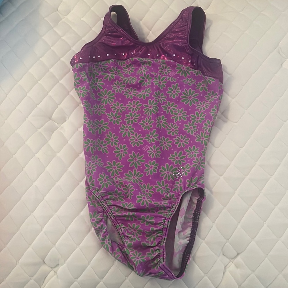 Jam wear Leo’s purple gymnastics leotard